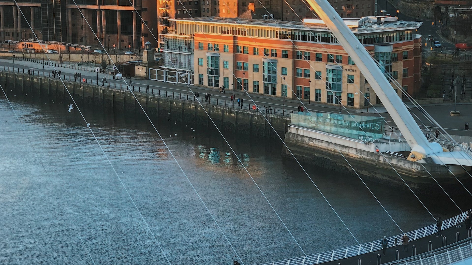 Newcastle upon Tyne cityscape featuring iconic landmarks and the River Tyne