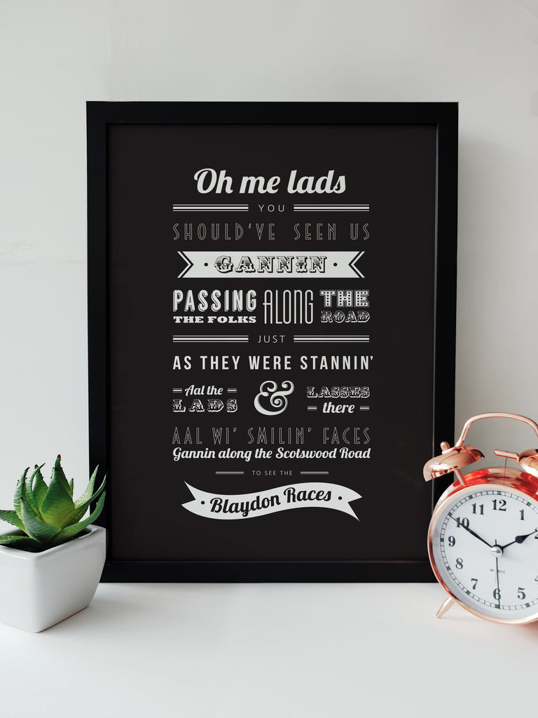 Monochrome print of 'Blaydon Races' lyrics, a Newcastle United football chant, in a variety of artistic fonts. designed by geordie gifts