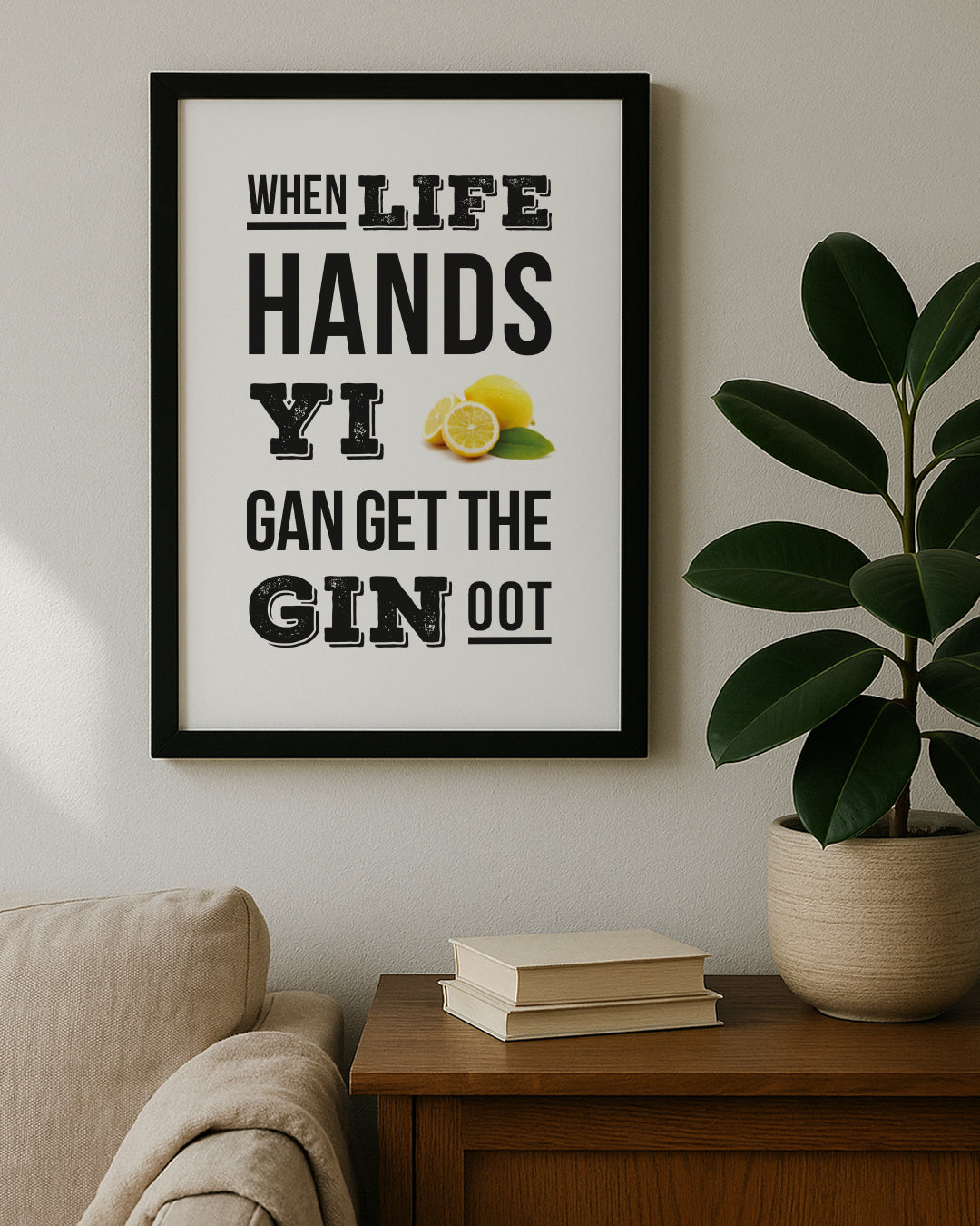 The funny Geordie gin typography poster hanging in a black frame on a neutral living room wall next to a houseplant.