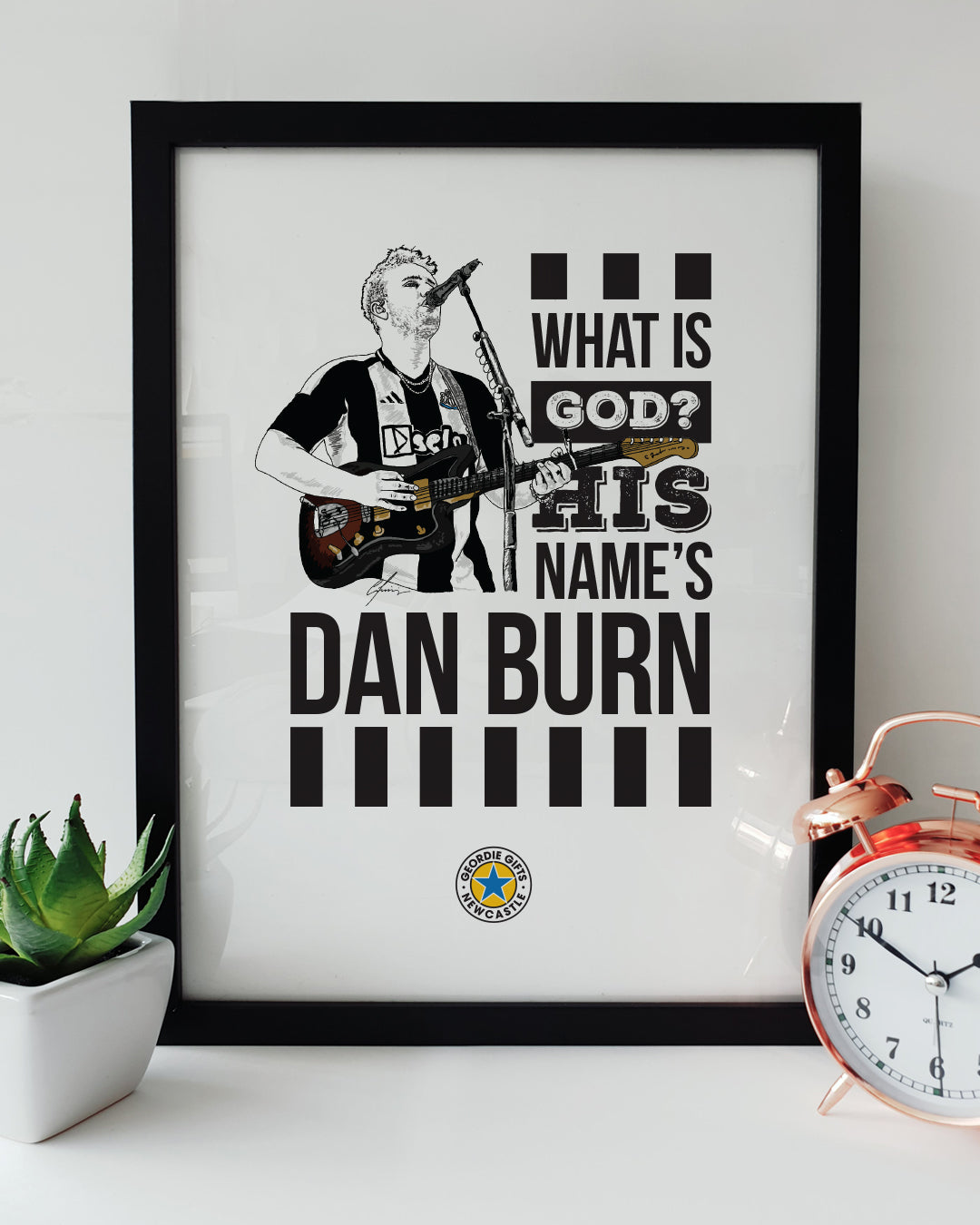 illustration of sam fender wearing a newcastle united shirt during his show in berlin on the night the toon army won the carabao cup final 2025 alongside the words what is god? his name's dan burn after he chanaged the lyrics to his song little bit closer. Print designed by geordie gifts
