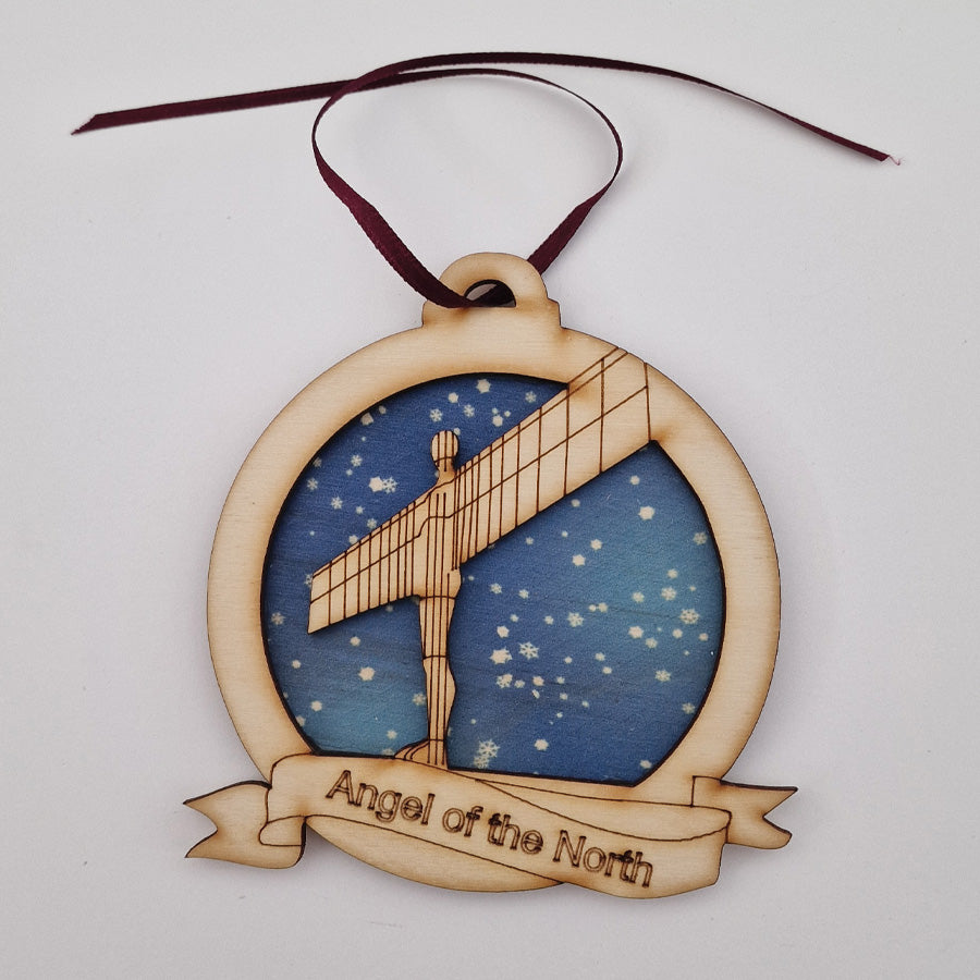 angel of the north at night snowflakes christmas tree wooden bauble decoration made by craft sensations sold by geordie gifts grainger market