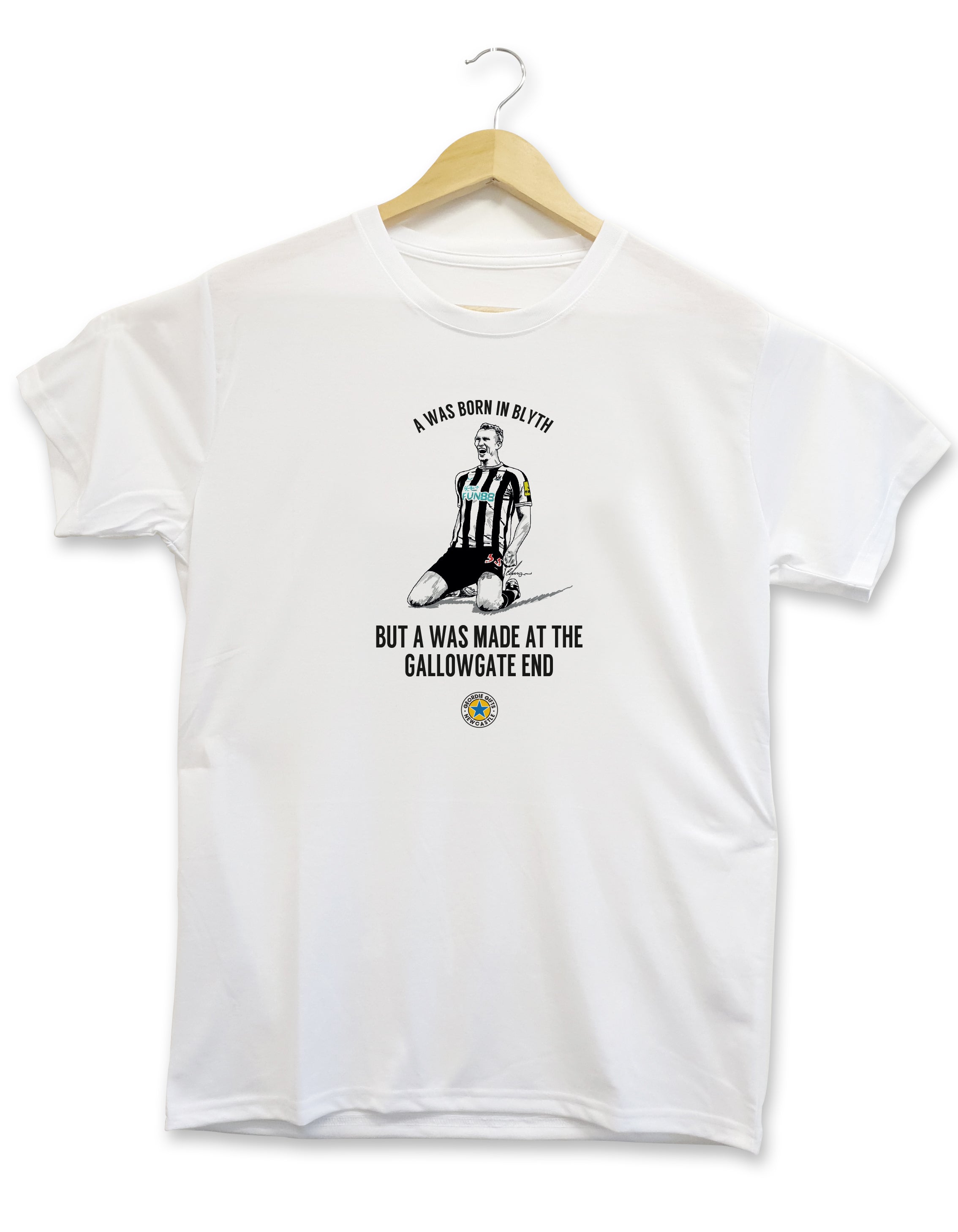 newcastle united football club themed t shirt designed and printed by geordie gifts. Design displays a hand drawn illustration of defender Dan Burn knee sliding at the Gallowgate end, St James' Park after scoring his first goal for the club against Leicester City in the Carabao Cup.