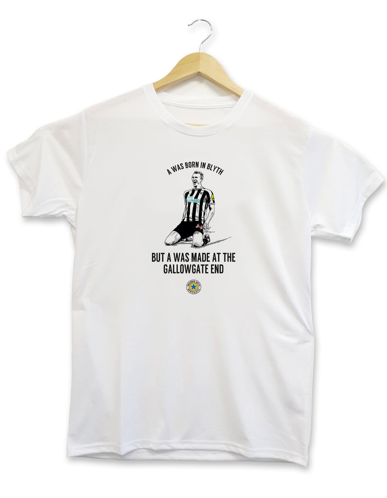 newcastle united football club themed t shirt designed and printed by geordie gifts. Design displays a hand drawn illustration of defender Dan Burn knee sliding at the Gallowgate end, St James' Park after scoring his first goal for the club against Leicester City in the Carabao Cup. 