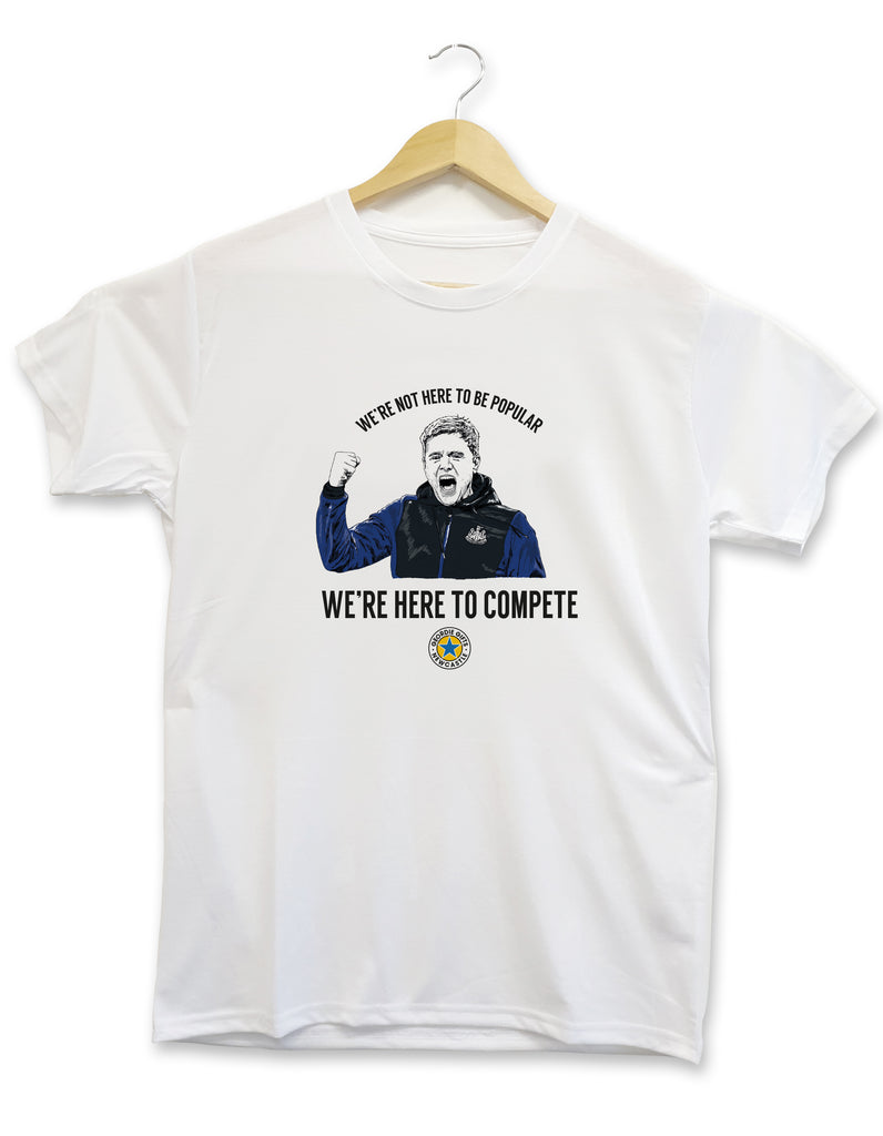 newcastle united football club shop themed t-shirt featuring handdrawn illustration of nufc manager eddie howe alongside the quote from an interview which reads 'we're not here to be popular, we're here to compete' made & designed by geordie gifts inside the grainger market