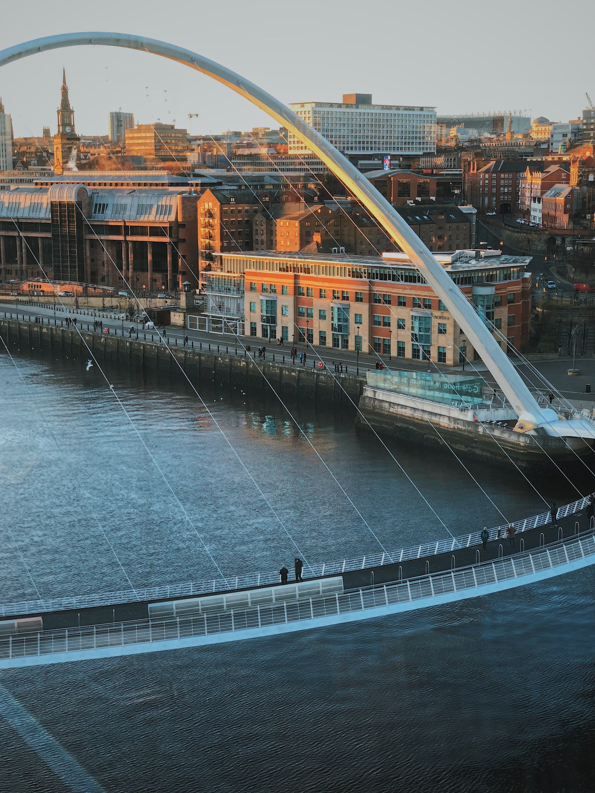Newcastle upon Tyne cityscape featuring iconic landmarks and the River Tyne