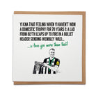 Handmade Geordie Gifts Newcastle United greeting card with a hand-drawn Dan Burn illustration, celebrating the cup win against Liverpool with a trophy, on a brown envelope background.