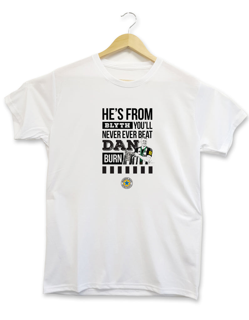 Geordie Gifts Newcastle United supporter T-shirt featuring a hand-drawn Dan Burn illustration with the Carabao Cup trophy and the fan chant ‘He’s from Blyth, you’ll never ever beat Dan Burn,’ displayed on a hanger.