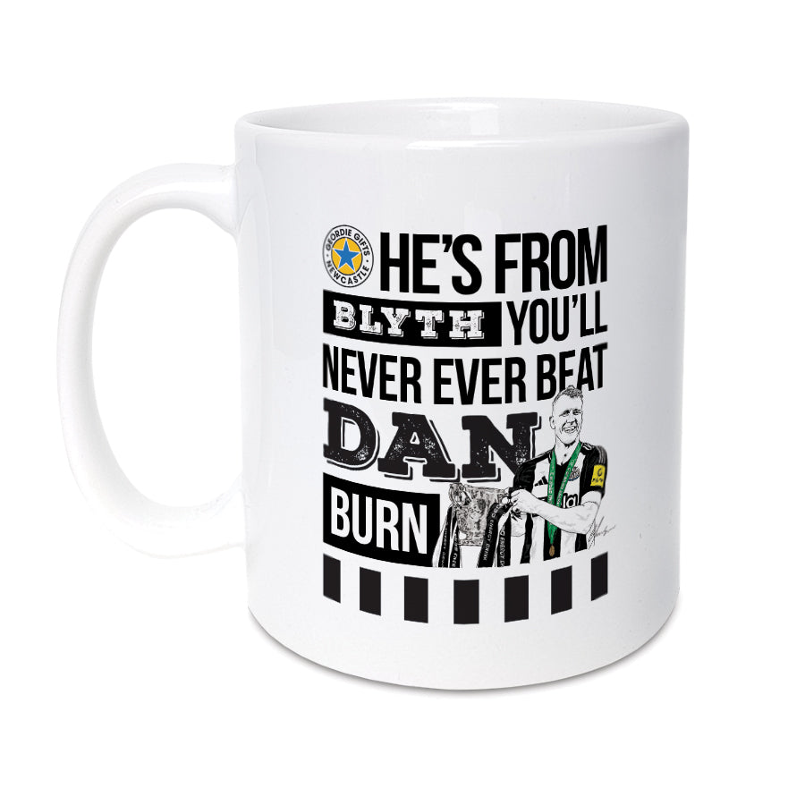 Geordie Gifts Newcastle United supporter mug featuring a hand-drawn Dan Burn illustration with the Carabao Cup trophy and the fan chant ‘He’s from Blyth, you’ll never ever beat Dan Burn