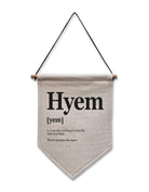 Geordie 'Hyem' linen flag decor measuring 20cm by 30cm, with the phrase 'There's nee place like hyem,' ideal for Newcastle-inspired interiors.