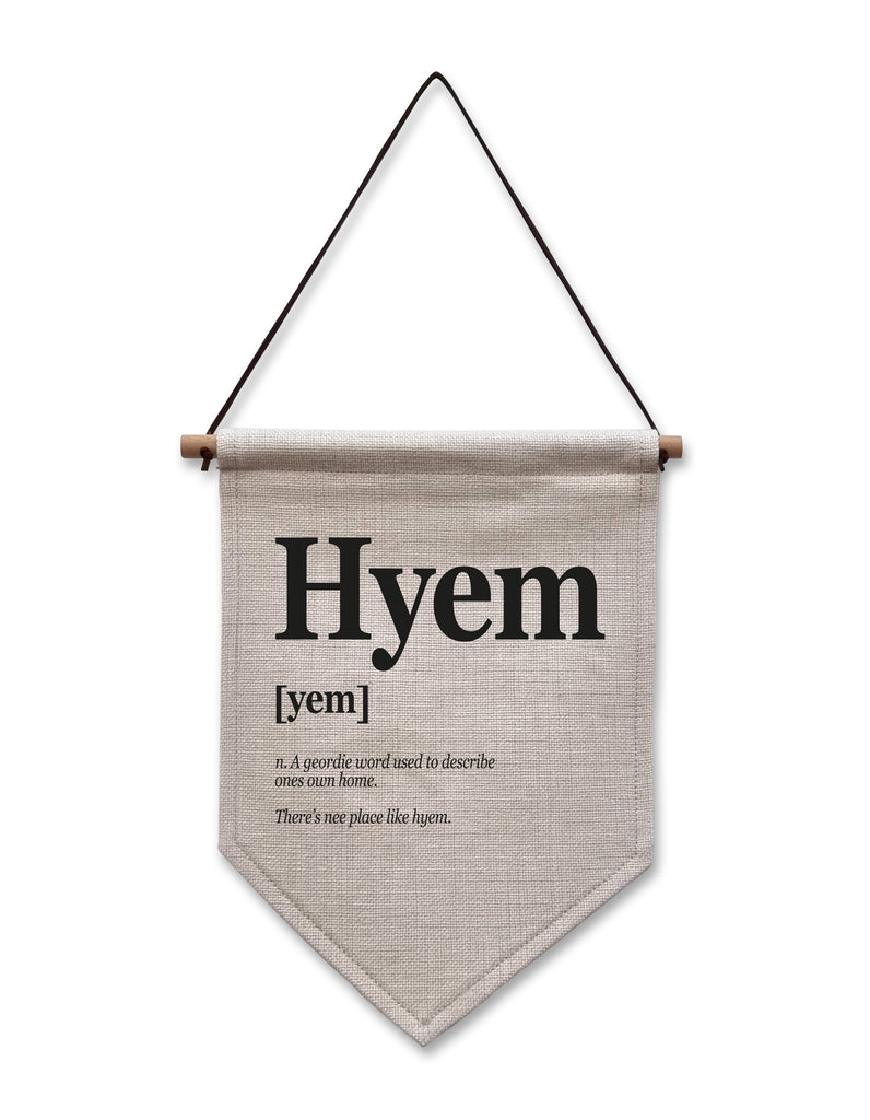 Geordie 'Hyem' linen flag decor measuring 20cm by 30cm, with the phrase 'There's nee place like hyem,' ideal for Newcastle-inspired interiors.
