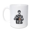 Illustrated mug featuring Liam Gallagher wearing a Newcastle United football shirt, celebrating his 1997 concert at the Metro Radio Arena, coinciding with Newcastle United's historic 3-2 win over Barcelona. Perfect gift for Oasis fans and Newcastle supporters, available at Geordie Gifts in Grainger Market.