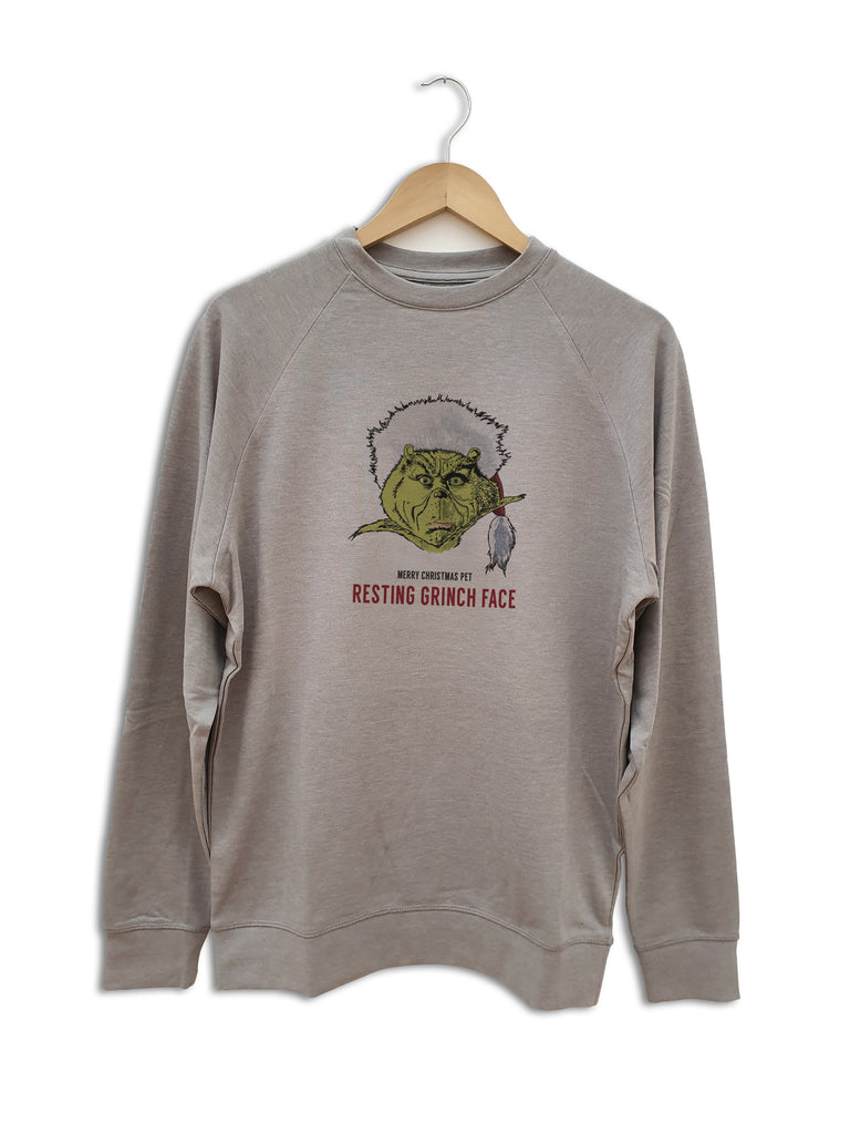 newcastle geordie christmas jumper featuring an illustration of the grinch. Words read: Merry Christmas pet - Resting grinch face