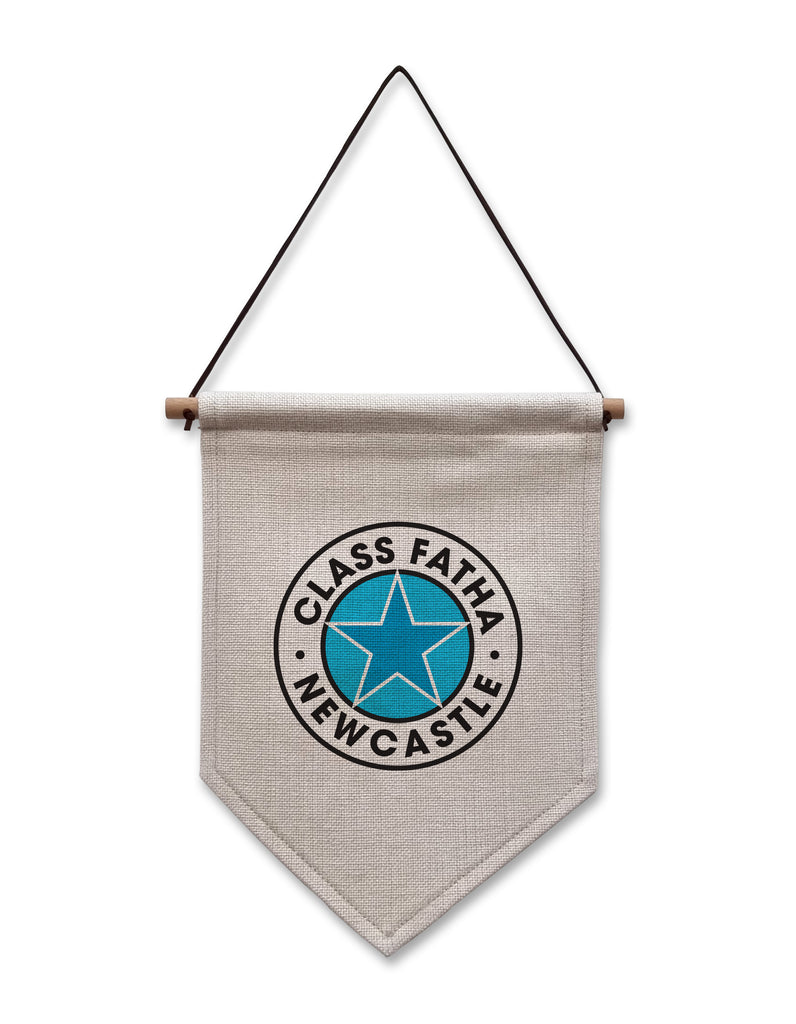 hanging linen flag hand printed with a geordie version of the newcastle brown ale bottle top badge which reads class fatha - Newcastle printed in 2 shades of blue. Designed & made in the north east by geordie gifts