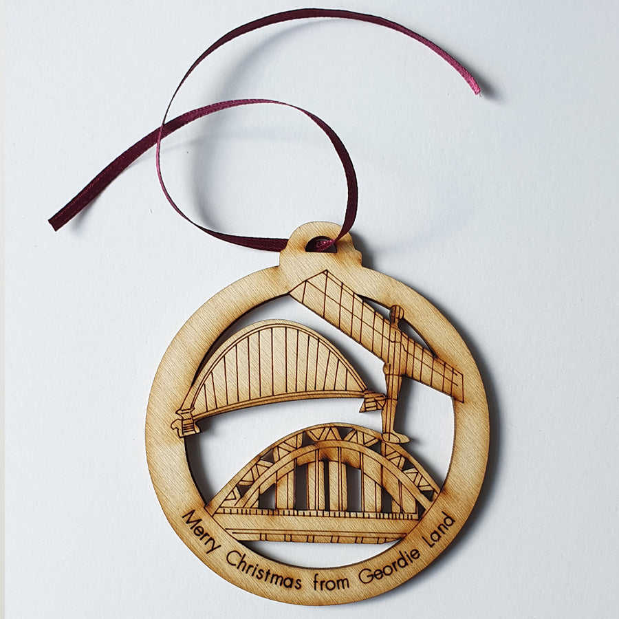 geordie christmas tree wooden bauble etched with tyne bridge, angel of the north & the millennium br